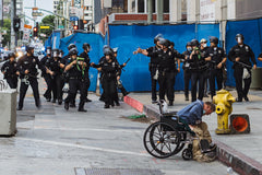 Kirk Tsonos captures photo of police brutality during arrest, leading to excessive force lawsuit