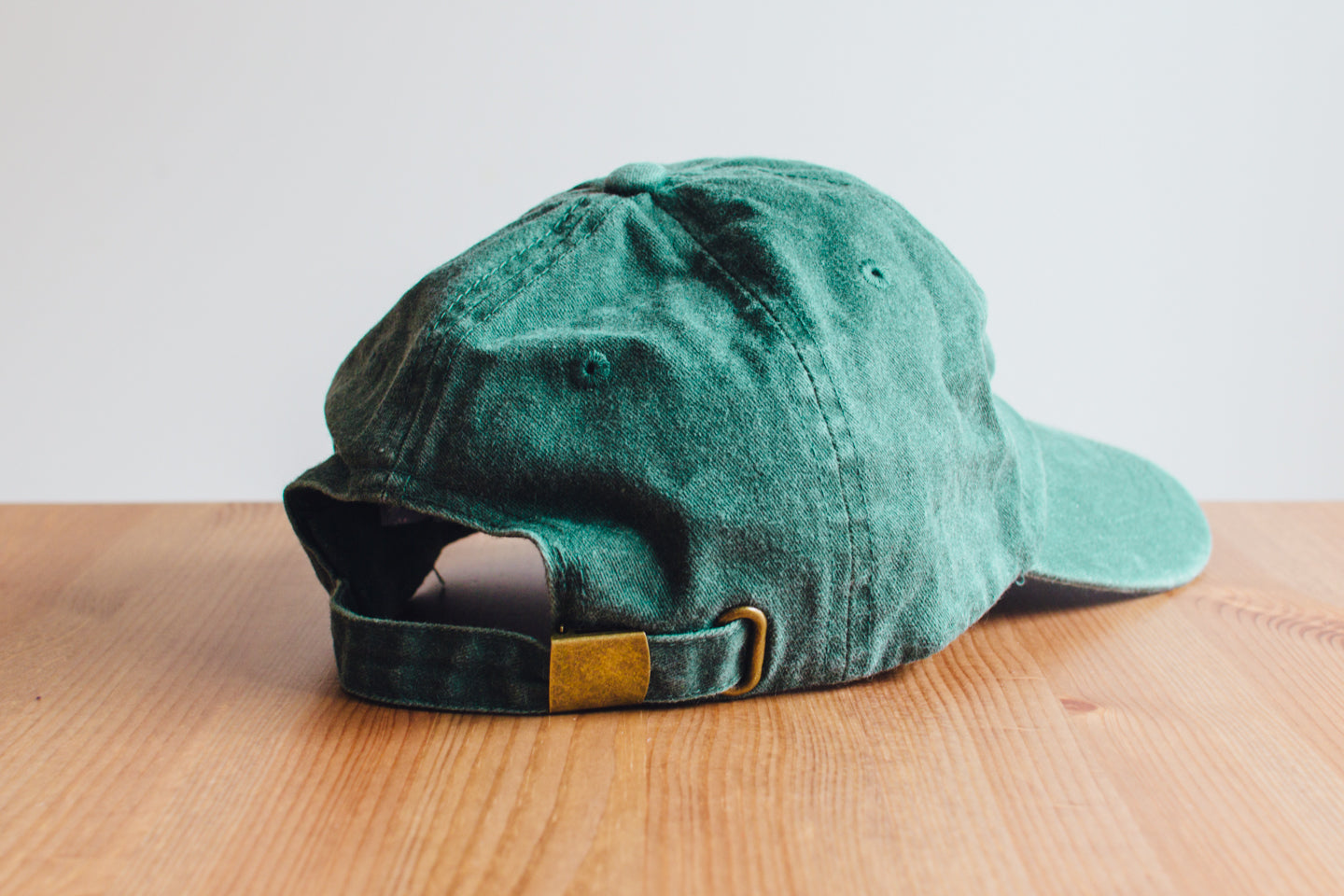 Nailed to the X Dad Hat in Forest Green