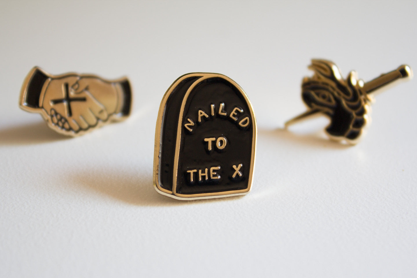 Nailed To The X Lapel Pin