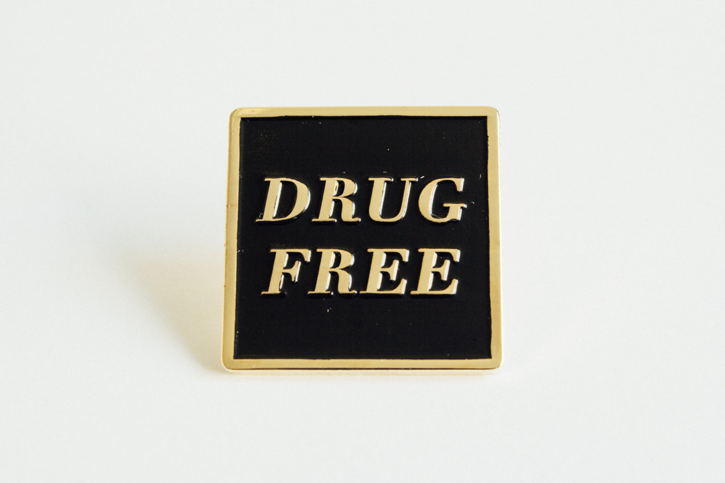 Drug Free Square Straight Edge Lapel Pin in black and gold by STRAIGHTEDGEWORLDWIDE