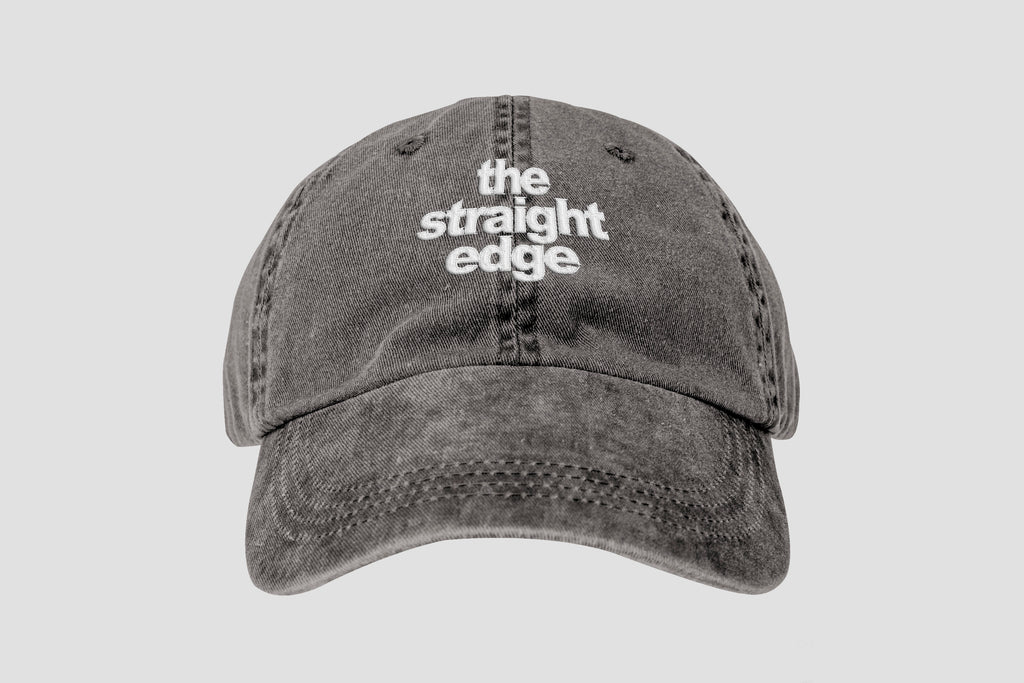 The Straight Edge pigment dyed strapback dad hat in black by STRAIGHTEDGEWORLDWIDE